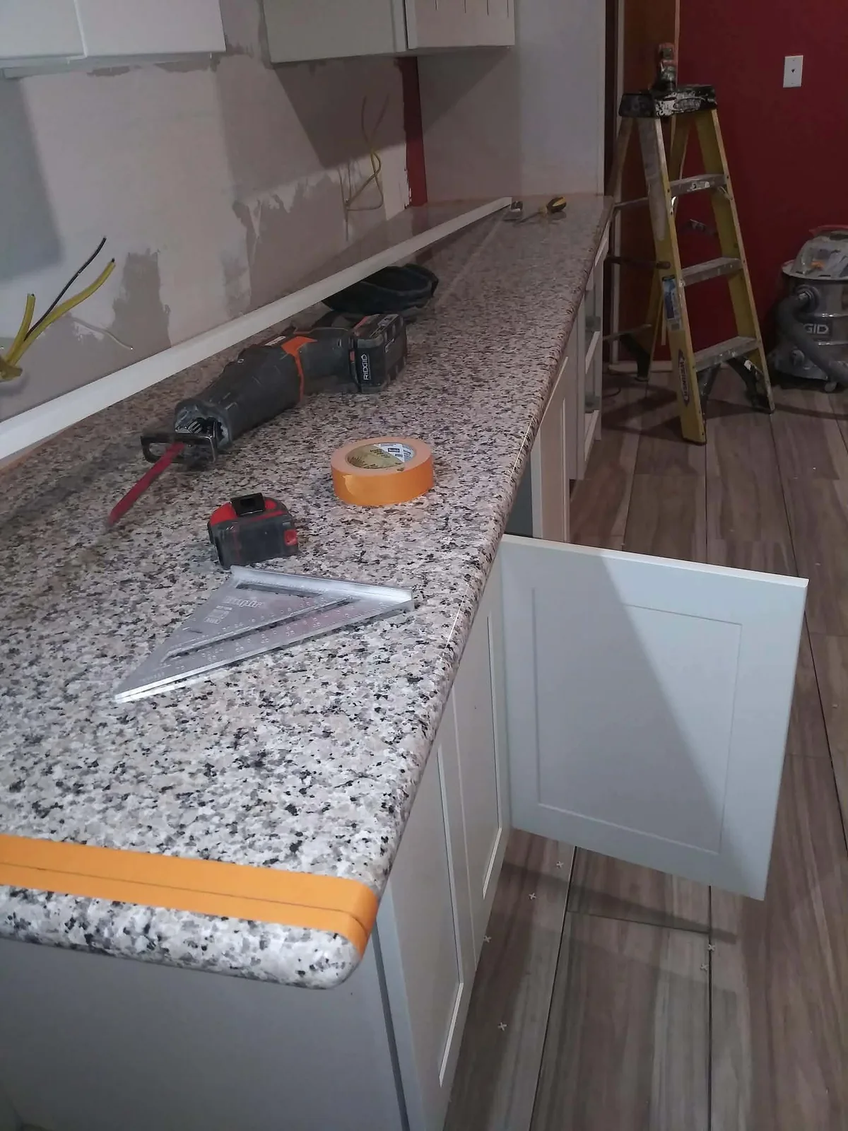 Granite kitchen countertop installation in progress