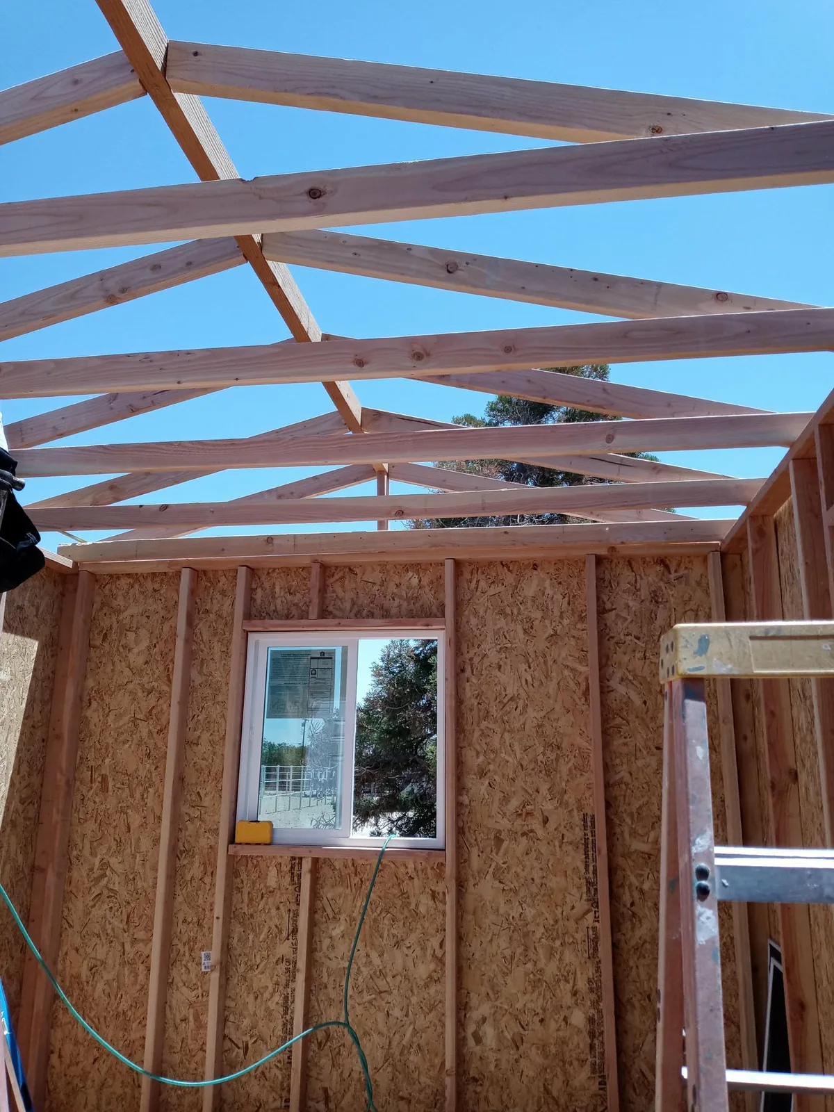 Wall and roof-truss framing for a new structure