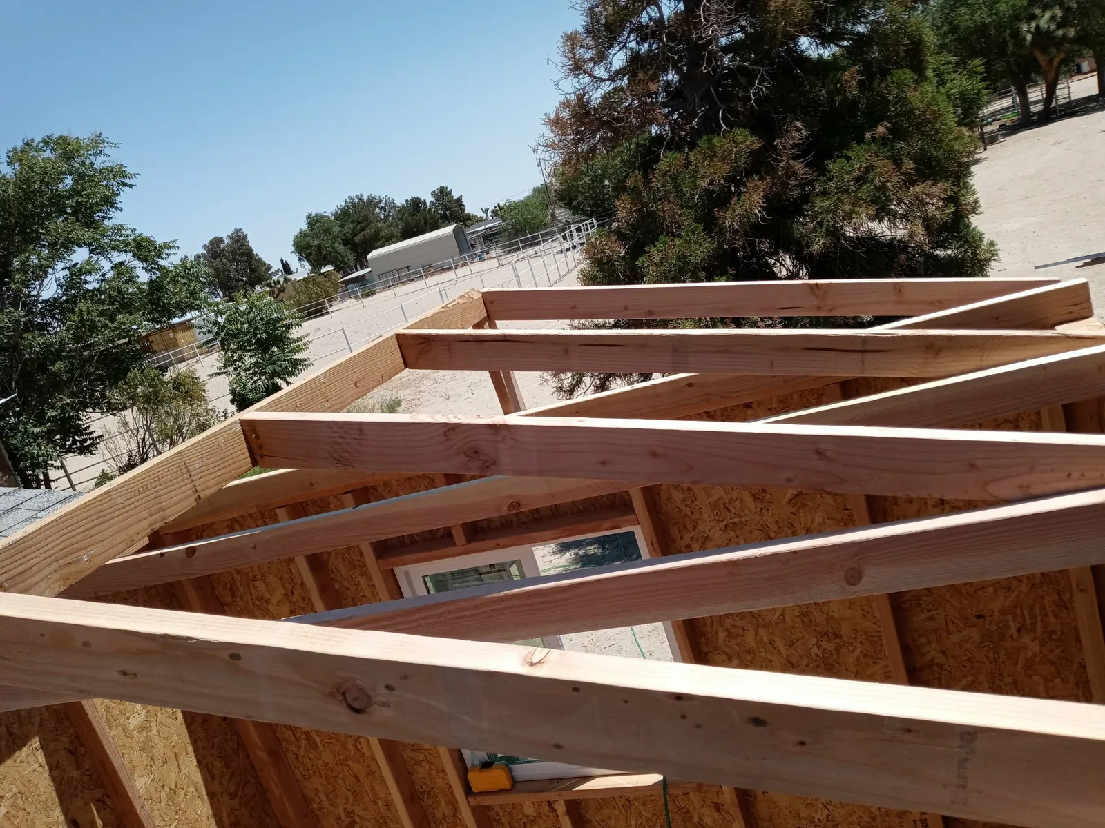 Close view of roof framing under construction