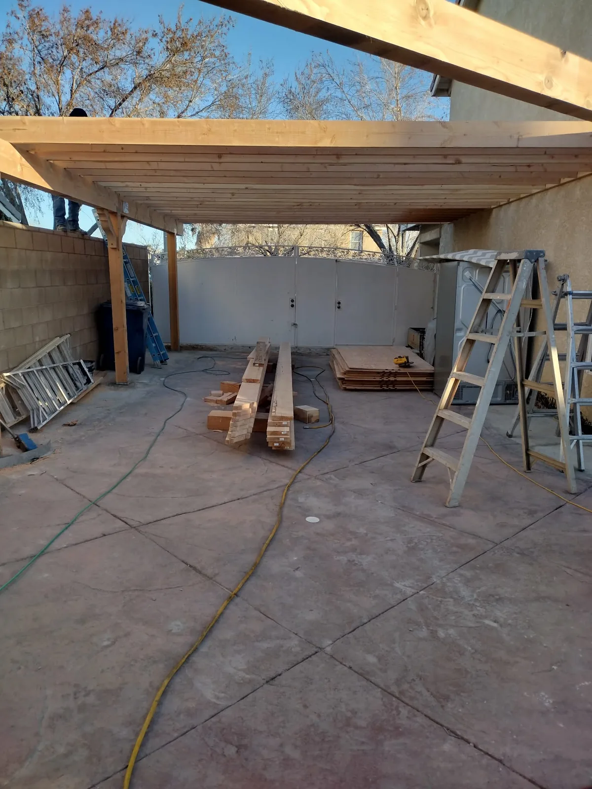 Large wood patio cover framing under construction